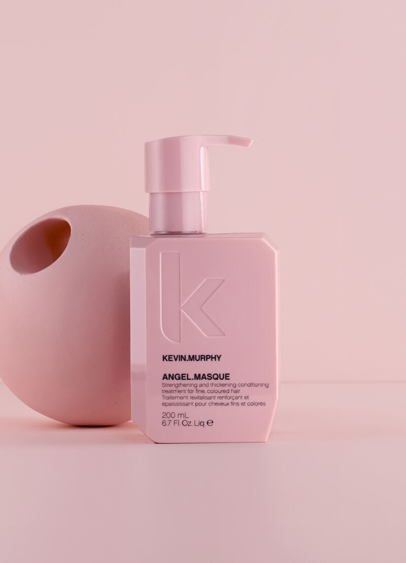 Kevin Murphy Angel Masque bottle on a pink background