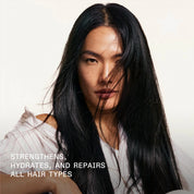 Person with long black hair against a plain background with text about hair care.