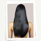 Long, straight black hair on a neutral background
