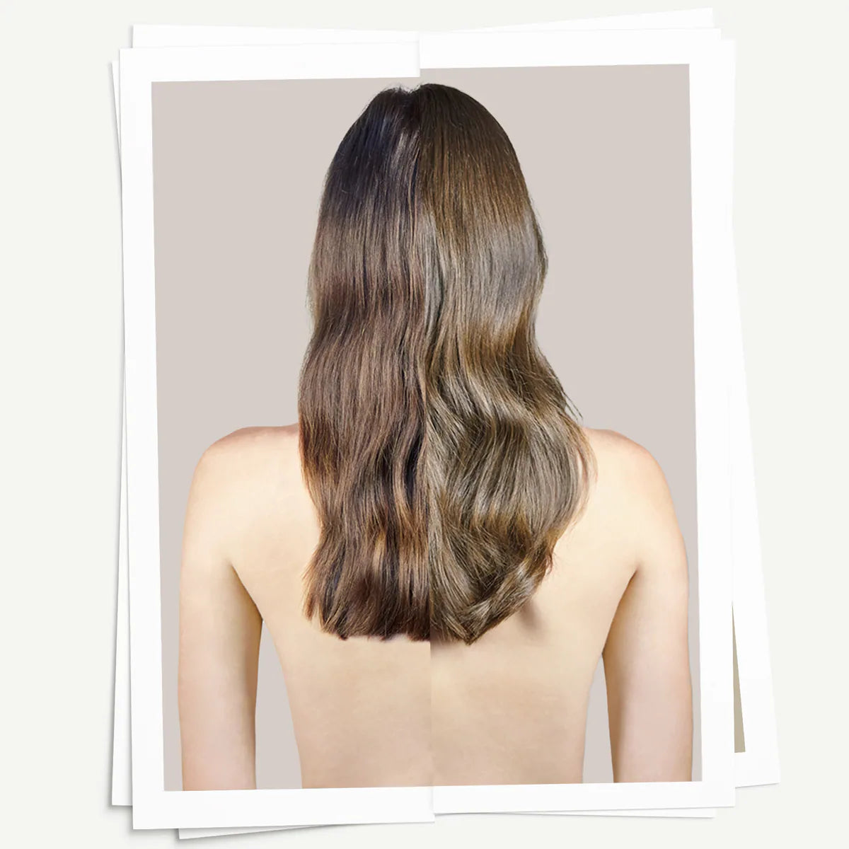 Person with long, wavy hair on a plain background