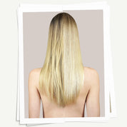 Long blonde hair on a neutral background