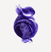 Purple shampoo foam texture on a white background