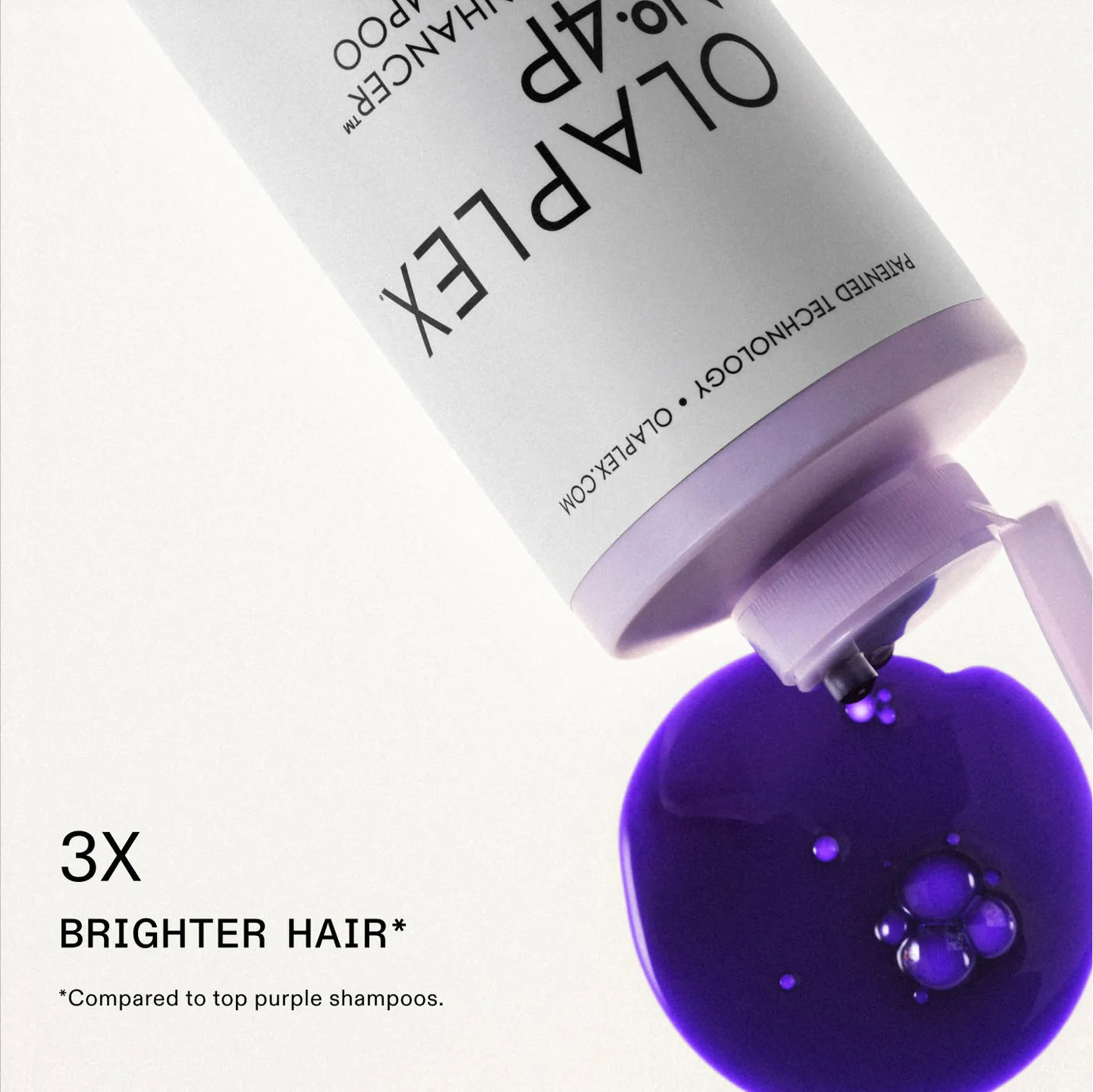 OLAPLEX hair product with purple liquid being poured out on a white background