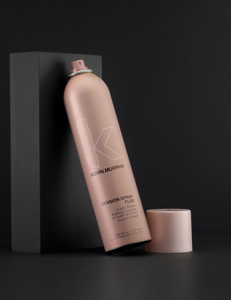 Kevin Murphy hair spray bottle on a black background