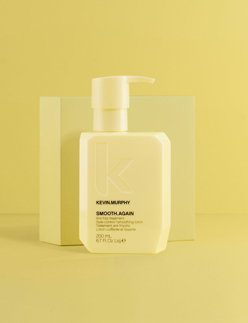 Kevin Murphy hair product bottle on a yellow background