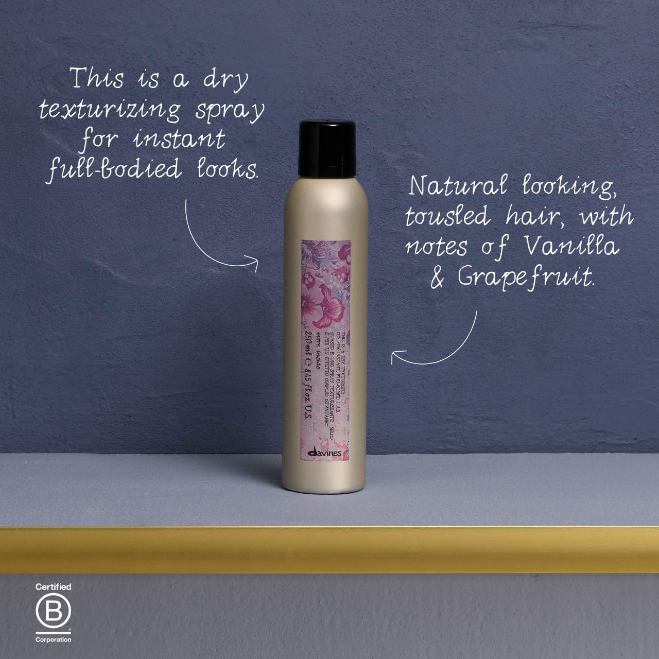 Hair spray bottle with text on a blue background