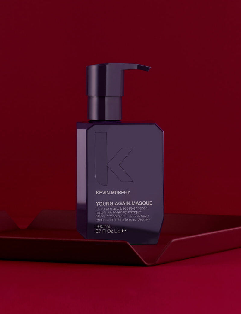 Kevin Murphy Young Again Masque bottle on a red background