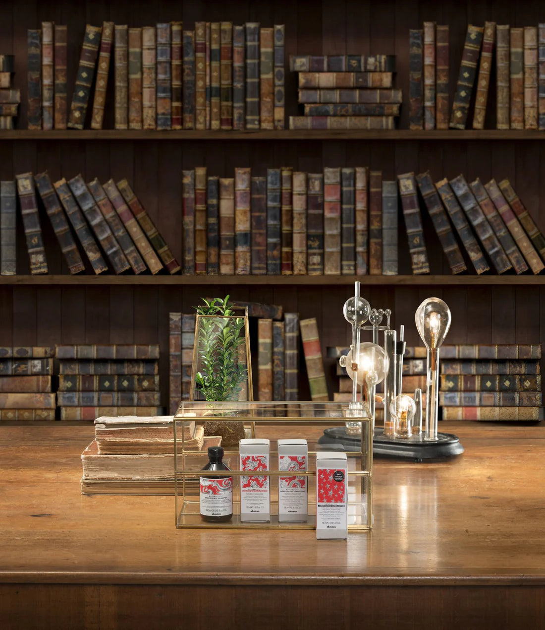 Vintage bookshelf with decorative items on a wooden surface