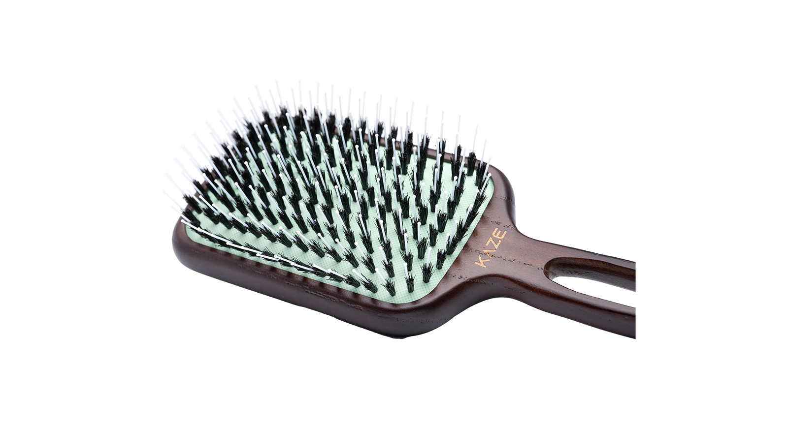 Hairbrush with wooden handle and bristle head on a white background